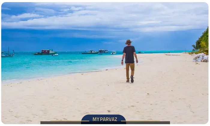 Walking on the pristine beaches of the Maldives